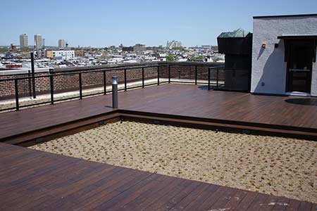 Northeast view of rooftop deck constructed with dassoXTR fused bamboo decking