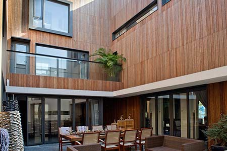 dassoXTR fused bamboo siding used on the villa exterior