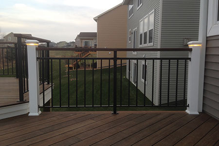 Illuminated railings surround deck constructed with dassoXTR fused bamboo decking