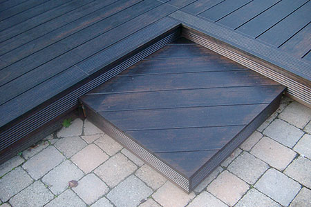 Closeup of patio step constructed with dassoXTR fused bamboo decking